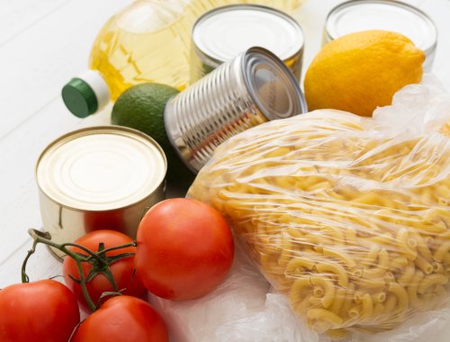 canned food, dried pasta and tomatoes