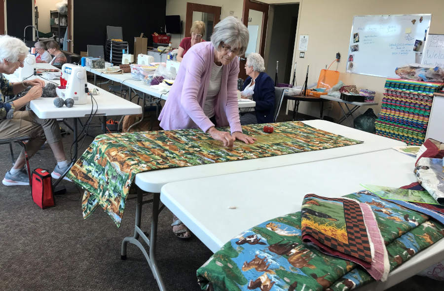 lady working on a quilt